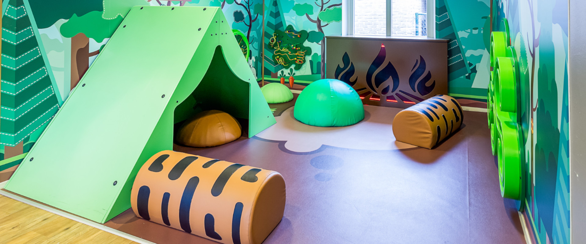 childcare themed playcorner with the camping theme 
