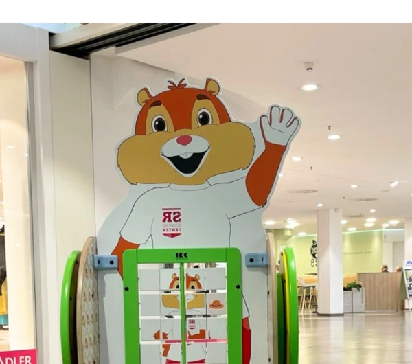 Interactive children's play panel with animal figure and number mat in a shopping mall