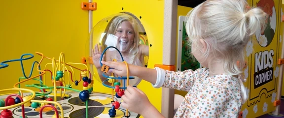 a bead table in a child-friendly enterprise