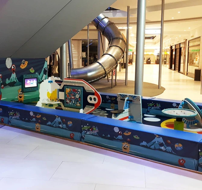 This image shows a custom kids corner within a shopping center in Spain