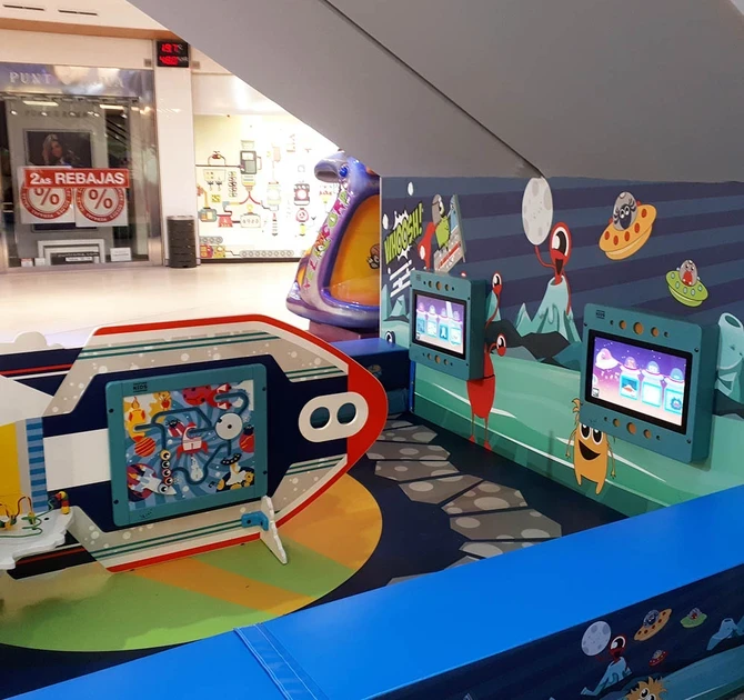 This image shows a custom kids corner within a shopping center in Spain