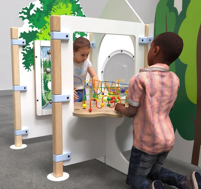 overzicht van een complete kinderhoek inrichting met kralentafel en diverse speelelementen